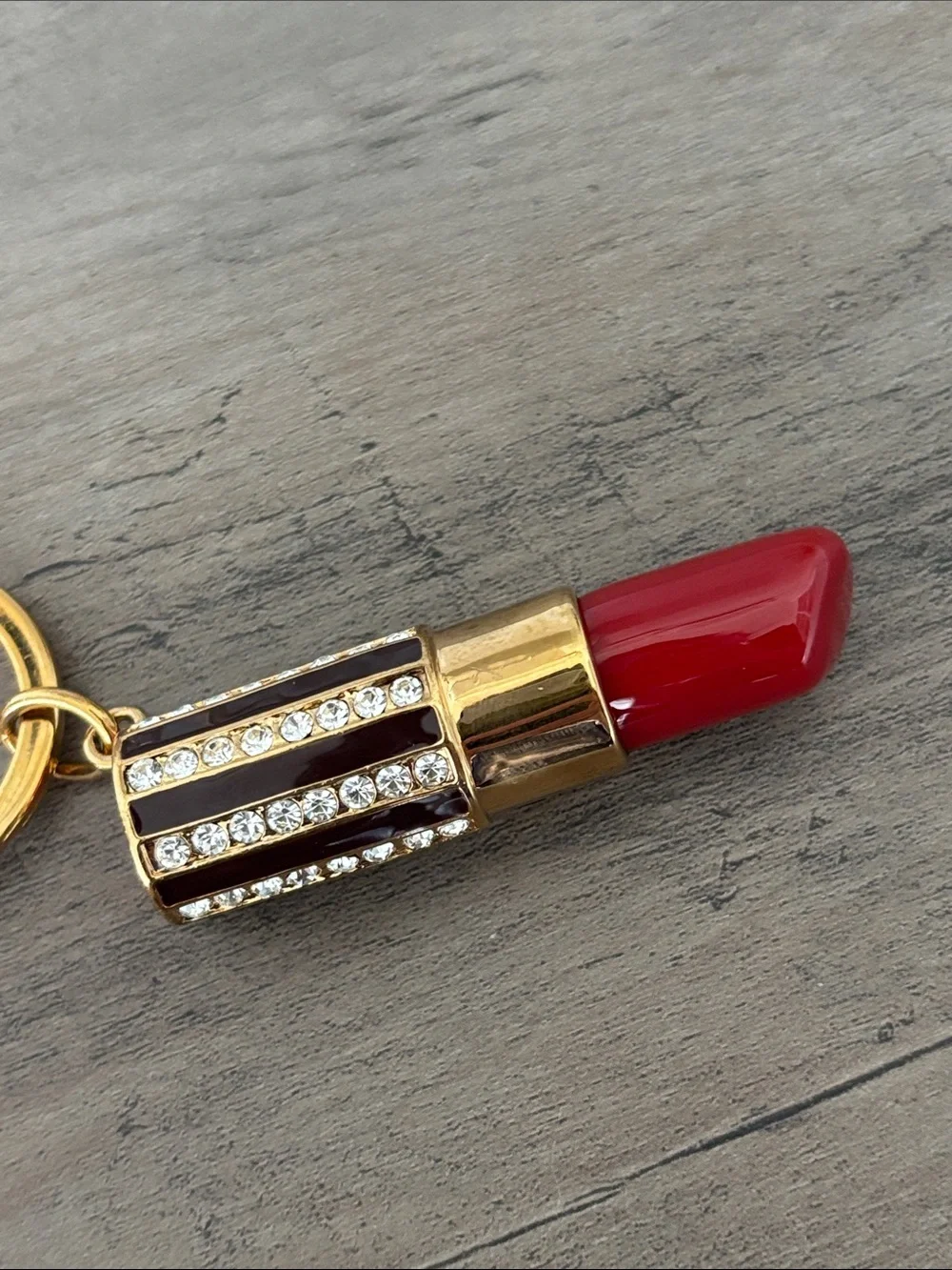 henri bendel Gold Lipstick Keychain with Red Accent